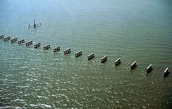 The Dauphin Island Bridge was destroyed by Hurricane Frederic, making it only reachable by boat.