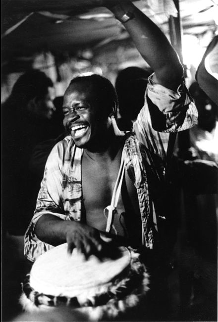 Drummer Frisner Augustin in a Vodou ceremony in Brooklyn, New York City, early 1980s.