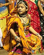 Little girl dressed in gagra choli during garba in Vadodara