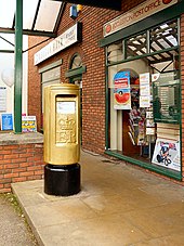 The post box painted gold to celebrate resident Bradley Wiggins' gold medal at the 2012 Summer Olympics