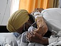 Jaswant Singh Kanwal with his son in bed ridden condition,Dhdhike