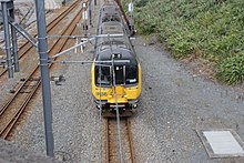 A Kapiti Line train leaving the Wellington marshalling yards northward Kapiti Line train at railyards.jpg