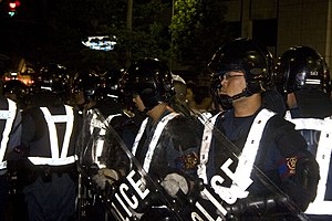 Kyoto Prefectural Riot Police Unit officers on duty during the Gion Matsuri 2008 festival. Kyoto Prefectural Police Mobile Unit.jpg