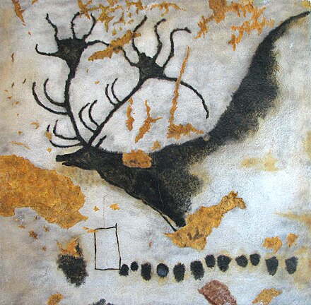 A charcoal and ochre cave painting of Megaloceros from Lascaux, France