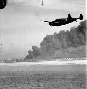 A Hudson of 220 Sqn over the Dunkirk beaches during the British evacuation, 1940.