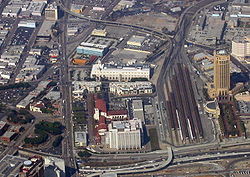 Los Angeles Union Station, hub for L.A. Metro trains and buses and Metrolink and Amtrak trains, and the Hollywood Freeway, one of Los Angeles' major thoroughfares Los Angeles Union Station.jpg