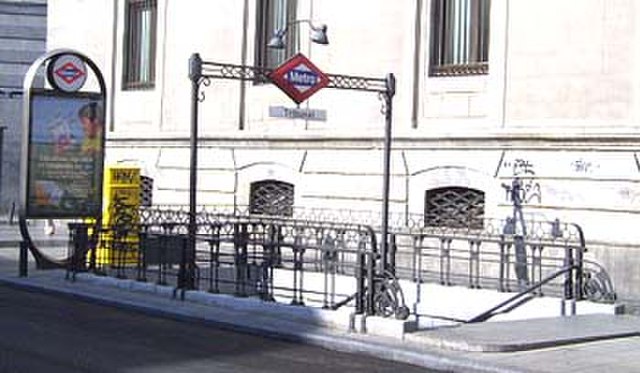 Typical Madrid metro entrance, designed by Antonio Palacios, at Tribunal station
