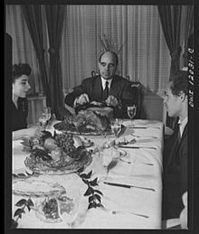 Dr. Mordecai Johnson, president of Howard University, serving portions of Thanksgiving turkey to members of his family in 1942 Mordecai Wyatt Johnson.jpg
