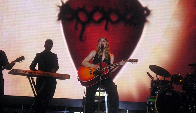 Madonna performing American Life's ninth track, "Mother and Father", during the Re-Invention World Tour