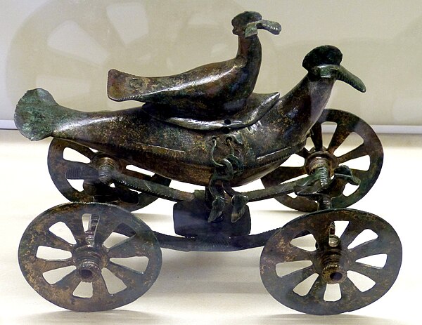 Representation of the most common Illyrian solar symbols: birds and circles with eight rays, on a 6th-century BC Glasinac bronze chariot; height 16.8 