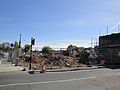 Demolition works taking place to old houses in Pyle Street, Newport, Isle of Wight in May 2012. Despite the works to demolish the buildings taking place in May 2012, at the time of writing (September 2014), no works to redevelop the area have been started.