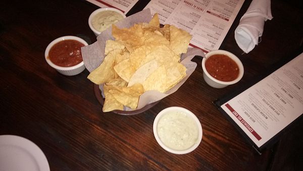 Original Ninfa's chips, tomato salsa, and green sauce