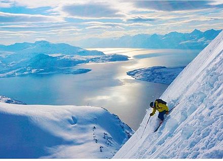 Ski mountaineering descent on a Norwegian peak.