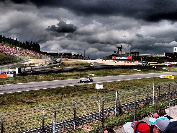 Rain clouds gather over the Ring during the 2011 German Grand Prix.