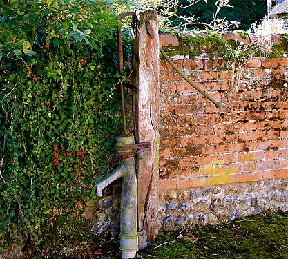 Old Pump in Farmyard