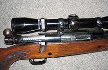 A bolt action rifle with the bolt position open, and jewelling detail on the bolt surface. Openboltcropped.jpg