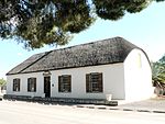 This house, with its predominantly Cape Dutch characteristics, was designed by the architect H. J. R. Burnett and completed in 1856. Type of site: Parsonage Previous use: Parsonage. Current use: Museum. Parsonage (Museum), Fraserburg.JPG