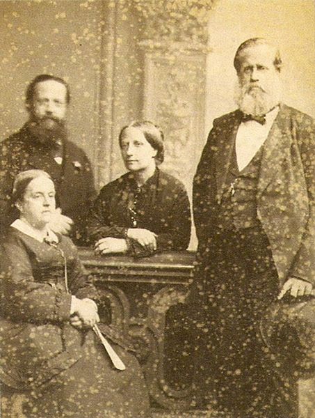 The Count and Countess of Aquila (seated, left) with the Emperor (right) and Empress of Brazil, c. 1871.