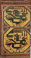 メダイヨン（中央の装飾枠）に龍と不死鳥が描かれたアナトリアの絨毯。15世紀