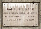 Photo d'une plaque gravée apposée sur un mur