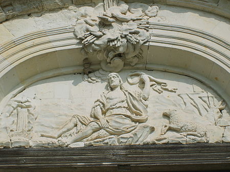 Saint Jean Bapstiste (tympanum of the entrance to the monastery, south side) Portal Chartreuse du Liget.JPG