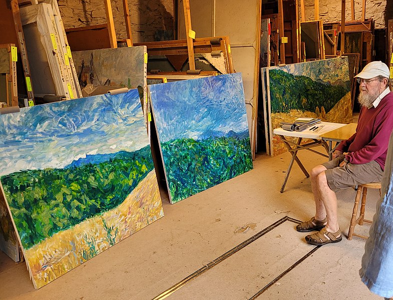 File:Ray Atkins with paintings summer 2022.jpg