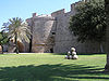 Rhodes-Palace of the Grand Master moat and wall.jpg