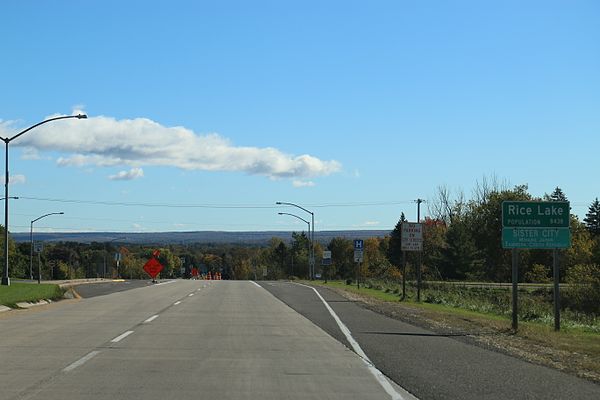 Looking east at the sign for Rice Lake on WIS 48