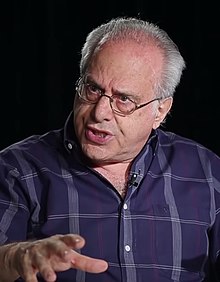 Richard D. Wolff is a Marxian economist who is a proponent of workers self-directed enterprises. Richard Wolff explaining capitalist planning.jpg
