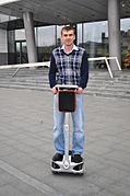 A self-balancing scooter with handlebars