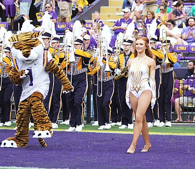 Mike and one of the LSU Golden Girls march onto the field for Pregame.