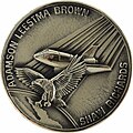 Медальон с емблемата на мисията
