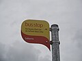 The bus stop flag at Salterns, along the Duver Seaview, Isle of Wight, seen in April 2011. It is served by Southern Vectis buses on school routes since route 8 was re-routed to serve Pondwell instead of travelling into Seaview via the Duver.