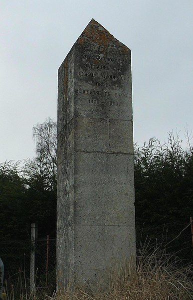 Stele at Saint-Martin-du-Tertre. The inscription refers to the geodesic survey of France 1866-1883.