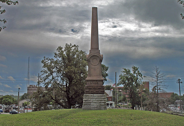 A monument to Nathaniel Lyon with the St. Louis Arsenal in the background