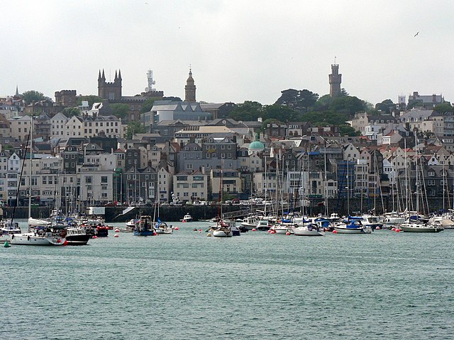 The school's main building on the skyline of Saint Peter Port from the east coast of the island