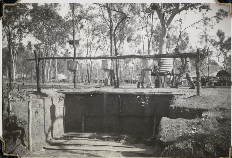 File:StateLibQld 2 247403 Improvised bush showers at the Rollingstone army camp, Queensland, 1943.jpg