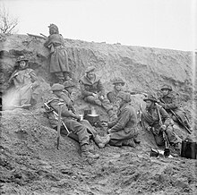 Infantry of the Monmouthshire Regiment cooking a meal in a forward position outside Uedem on 1 March 1945 The British Army in North-west Europe 1944-45 B14959.jpg