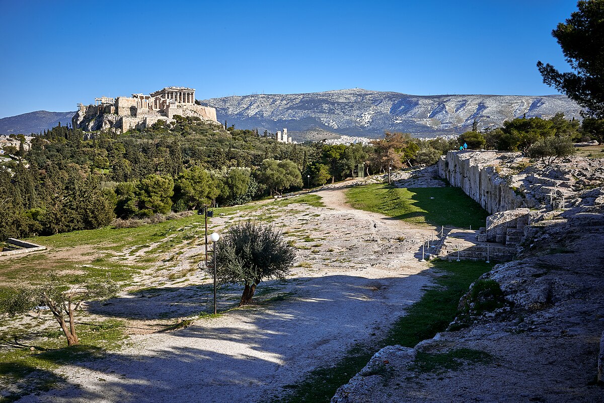 Εικόνα https://upload.wikimedia.org/wikipedia/commons/thumb/1/1d/The_Pnyx_plateau_in_Athens_on_February_19%2C_2021.jpg/1200px-The_Pnyx_plateau_in_Athens_on_February_19%2C_2021.jpg