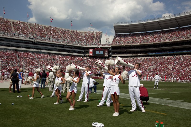 File:The cheerleaders are amazing to watch. The boys throw the girls into the air as they cheer on their winning team. University of Alabama football game, Tuscaloosa, Alabama LCCN2010638322.tif
