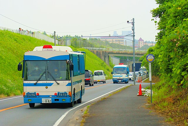 Riot squad vehicles patrolling the outskirts of Tokyo Narita Airport