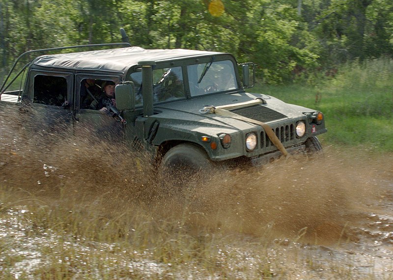 File:US Navy 060503-N-9246W-076 Lt. j.g. Charles Roy, assigned to Naval Mobile Construction Battalion Seven Four (NMCB-74) takes a defensive position.jpg