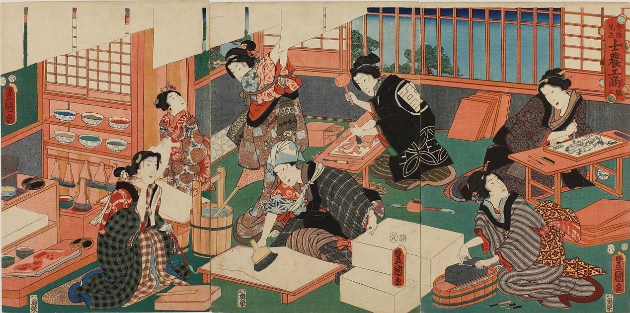 The woodblock printing process, Kunisada, 1857. A fantasy version, wholly staffed by well-dressed "beauties". In fact, few women worked in printmaking;[201] Hokusai's daughter Katsushika Ōi was one.