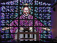 Christ of the Eucharist designed by Dom Charles Norris from Buckfast Abbey, Devon, England, slab glass.