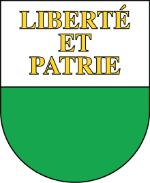Les couleurs du Canton de Vaud sont le vert clair et le blanc. Le sceau du Canton de Vaud aura pour empreinte, conformément au modèle présenté, un écusson coupé en deux bandes vert et blanc. Dans le champ blanc, on lira liberté et patrie.