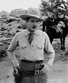 Still with Warner Baxter. Warner Baxter Drums of the Desert.jpg