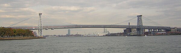 Full span, as seen from Wallabout Bay with Greenpoint and Long Island City in background