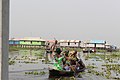 Women Riding On their Canoen.jpg