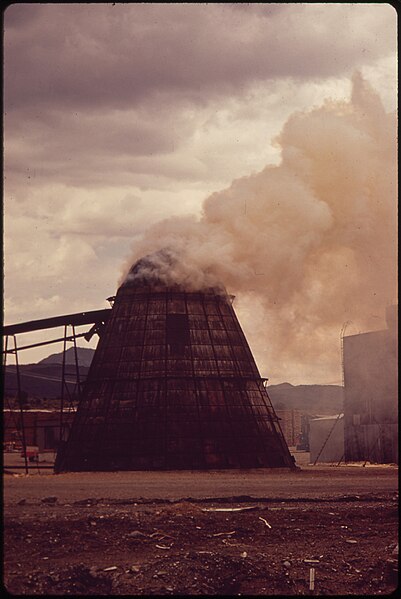 File:"TEEPEE" BURNER INCINERATES WOODCHIPS AND SAWDUST FROM THE LUMBERMILL - NARA - 544958.jpg