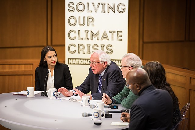 Ocasio-Cortez and Senator Bernie Sanders in December 2018